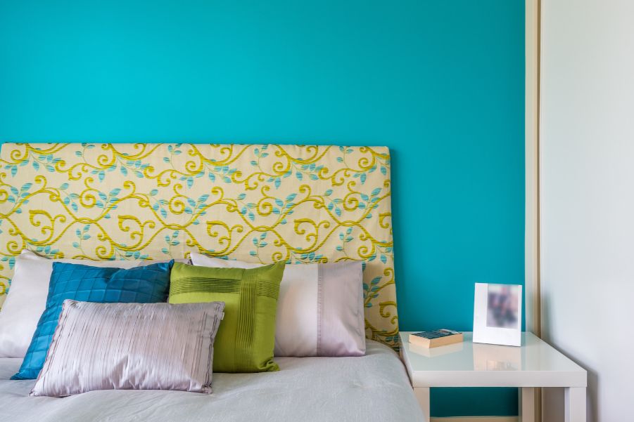 bright aqua accent wall bedroom