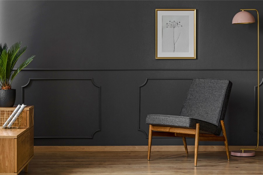 dark black gray wall with chair