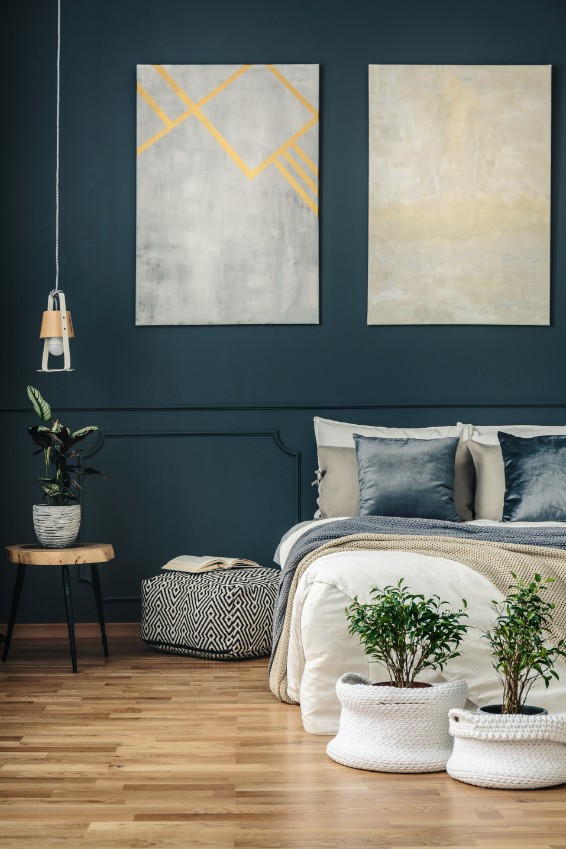 bedroom with dark teal wall