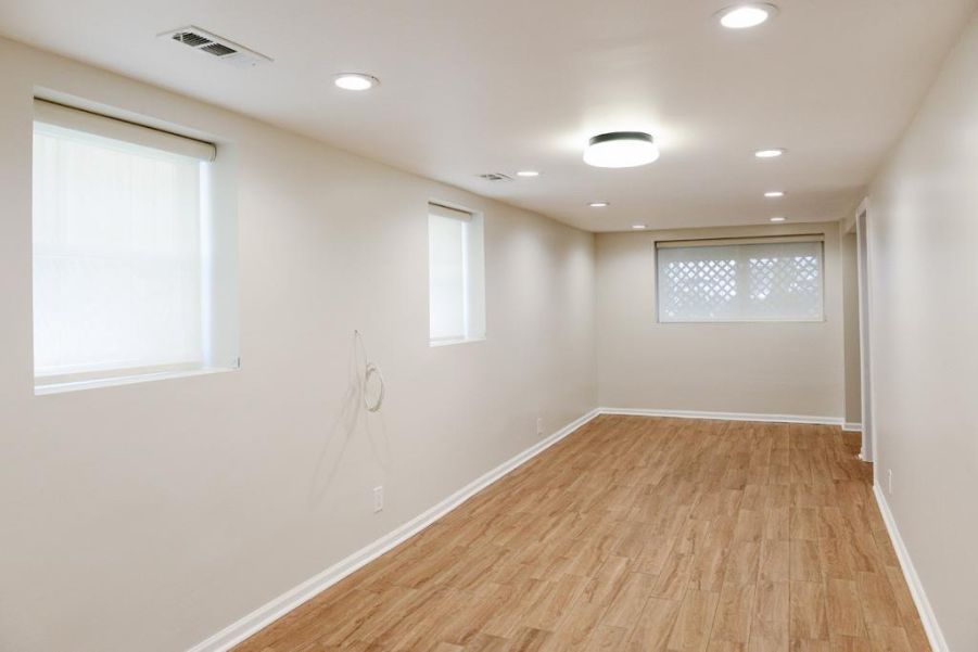 basement living room white walls