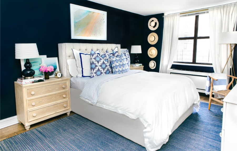Apartment Bedroom With a Blue Color Scheme