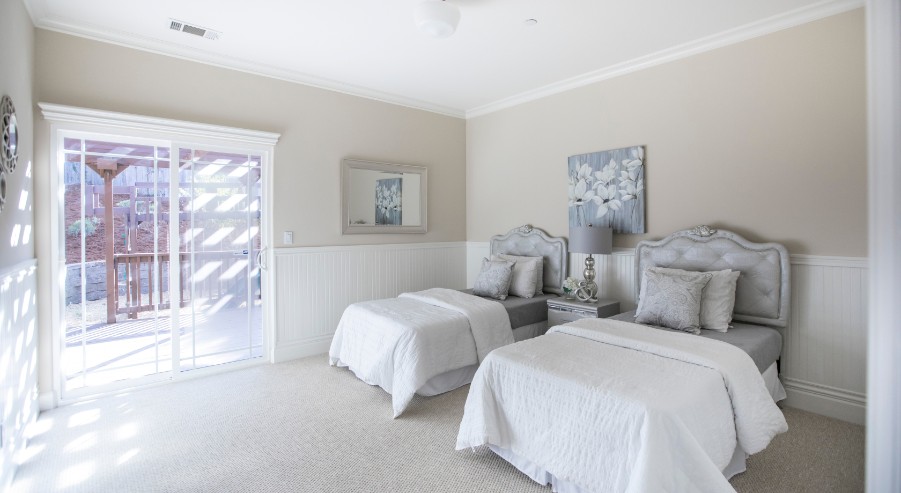 double twin beige guest bedroom