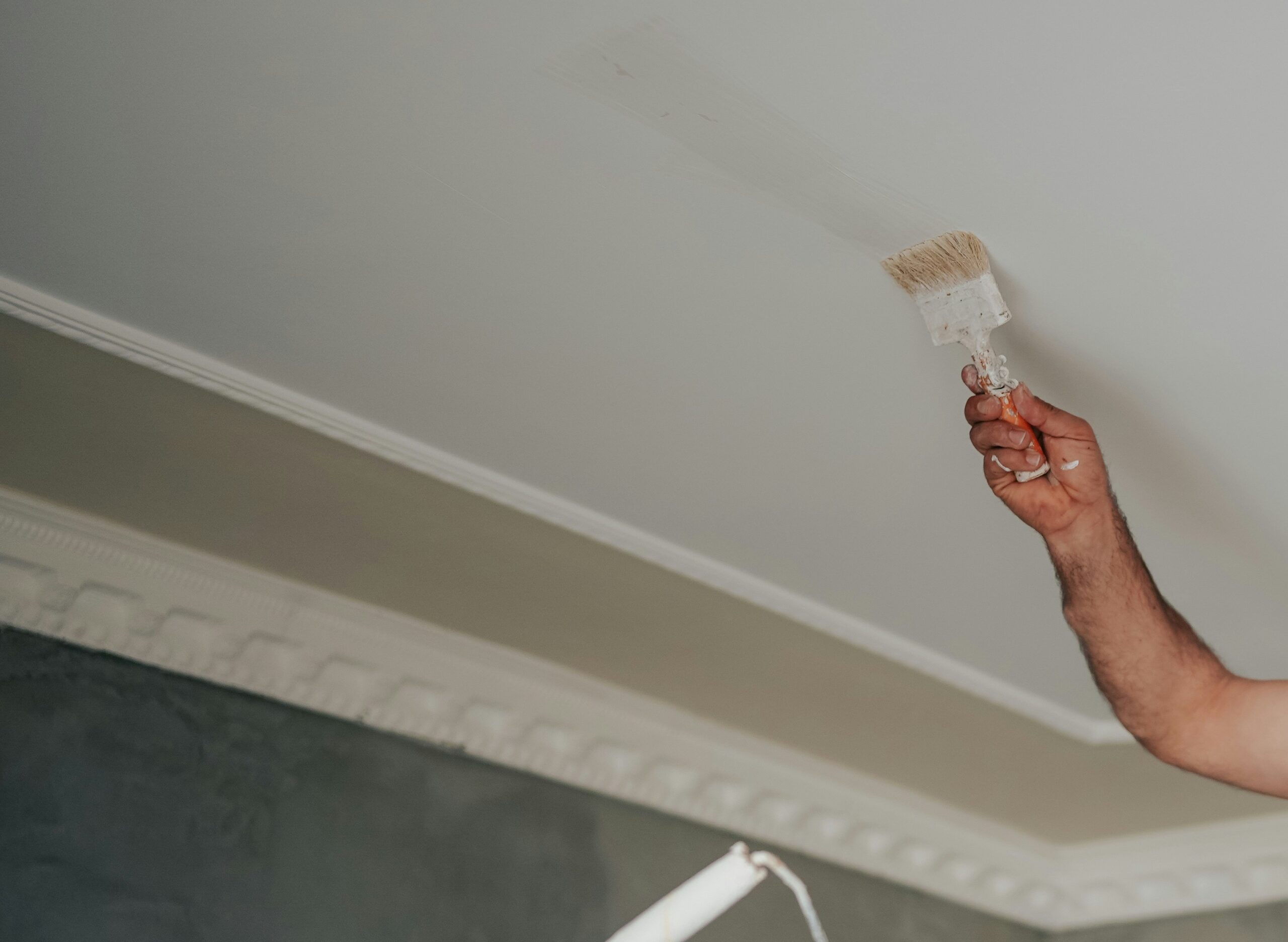 Maintaining a wet edge and inspecting as you go ensures even, drip-free coverage.