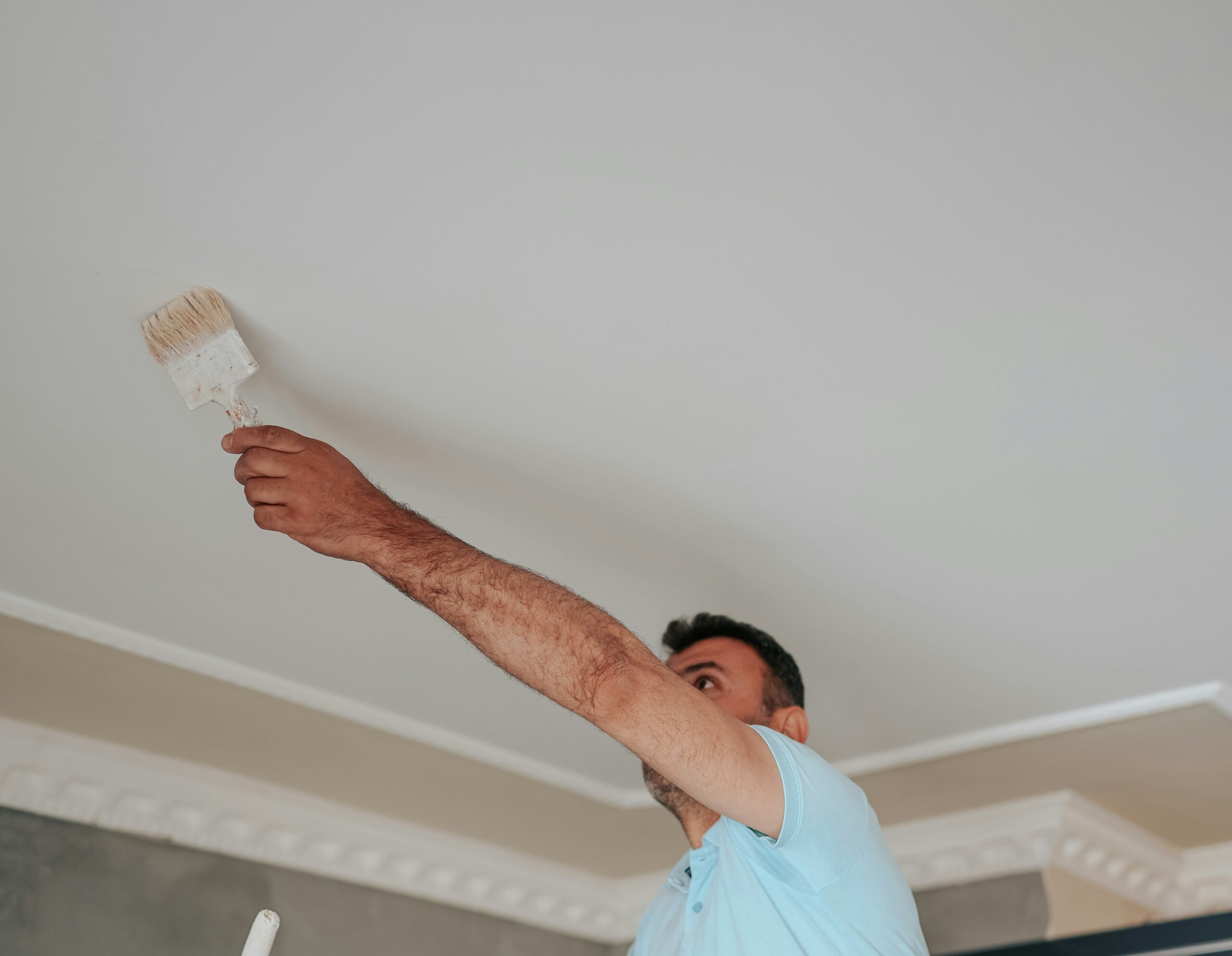Proper preparation when painting a ceiling can prevent dripping