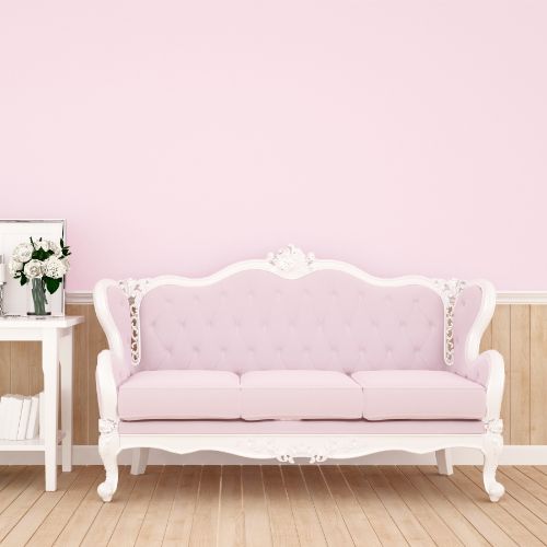 victorian couch in bright pink living room