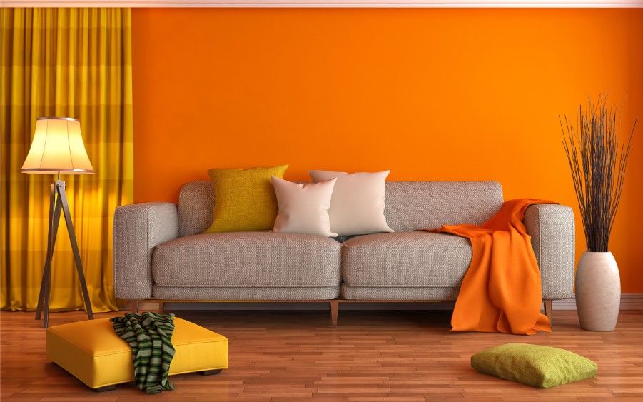 orange living room gray couch
