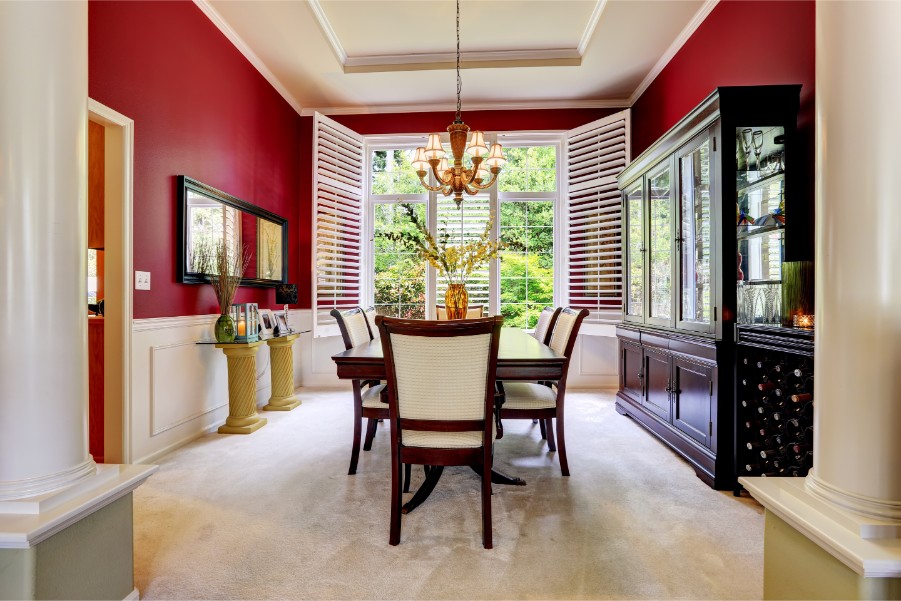 Red Dining Room with White Chairs