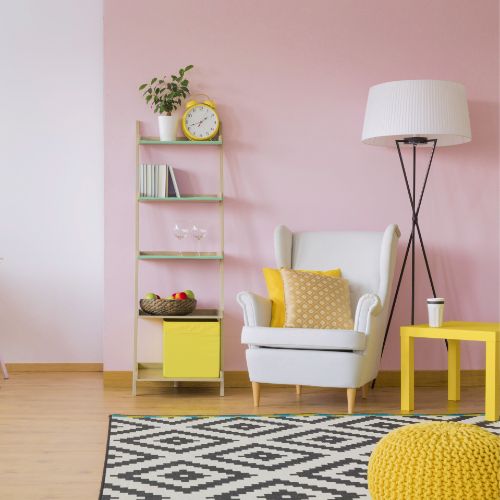 pink accent wall in living room