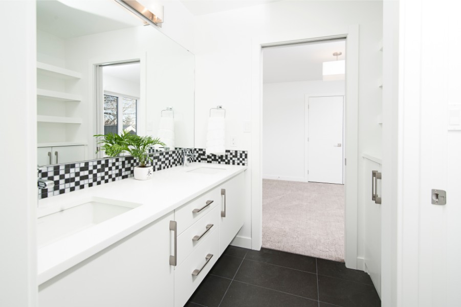 bathroom with black floors