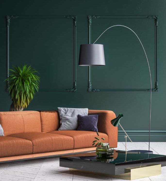 dark green wall brown couch