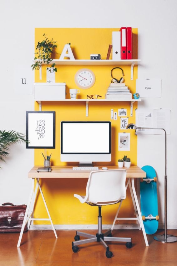 home office with yellow accent wall