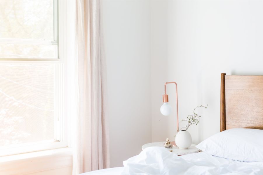 white walls bedroom soft peach curtains