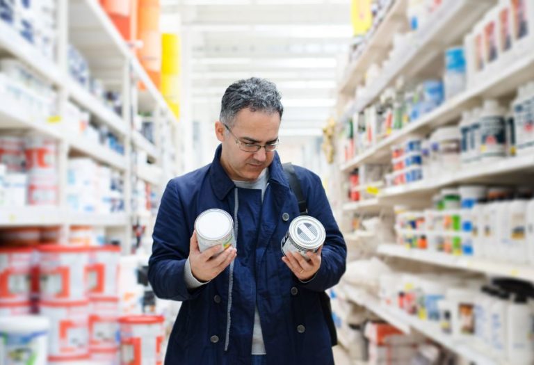 man choosing paint color