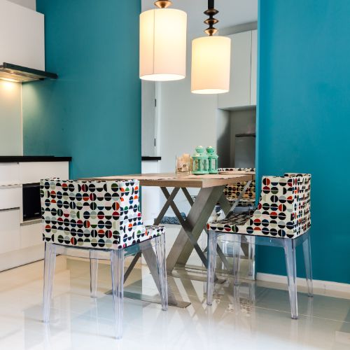 aqua teal kitchen with white cabinets